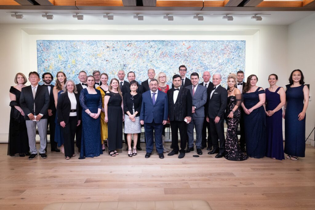 Photo of the 2025 Samuel J. Heyman Service to America Medals honorees, also known as Sammies, standing next to each other in front of a large painting